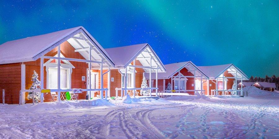 Cottage tra la neve lappone e l’Aurora Boreale